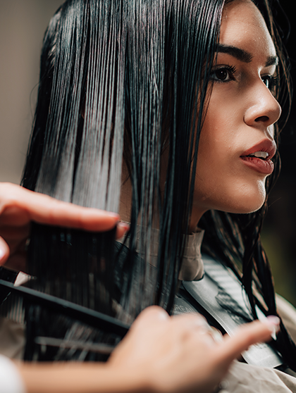 Woman getting her hair cut.