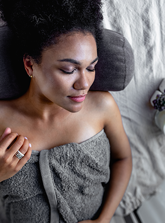 Woman lying down waiting for massage.